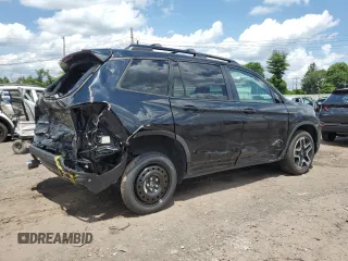 2023 Honda Passport Elite with VIN 5FNYF8H01PB030270, listed as a Copart auction lot 61402965 with 7,931 mi miles and Salvage title. Bid and sale history available at DreamBid. Image 3.
