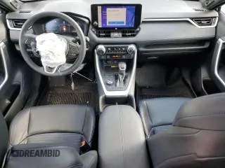 2023 Toyota RAV4 Hybrid XSE with VIN 4T3E6RFV1PU112579, listed as a Copart auction lot 74387924 with 103,340 mi miles and Salvage title. Bid and sale history available at DreamBid. Image 8.