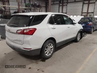 2018 Chevrolet Equinox LT z VIN 3GNAXJEV9JL410690, wystawiony jako IAAI lot #41571620 z przebiegiem 21 797 mil mil oraz . Historia ofert i sprzedaży dostępna na DreamBid. Obrazek 4.