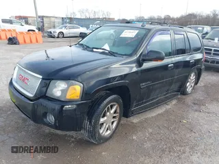 2008 GMC Envoy Denali with VIN 1GKET63M082187436, listed as a IAAI auction lot 41726422 with 195,918 mi miles. Bid and sale history available at carsss.com. Image 2.
