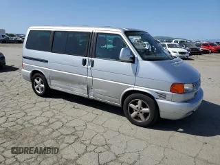 2002 Volkswagen EuroVan MV with VIN WV2MB470X2H068241, listed as a Copart auction lot 51183275 with 194,130 mi miles and Salvage Title. Bid and sale history available at DreamBid. Image 4.
