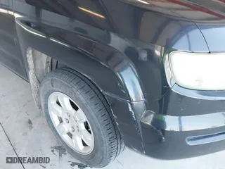 2006 Honda Ridgeline RTL with VIN 2HJYK16556H566886, listed as a IAAI auction lot 42077035 with 124,310 mi miles. Bid and sale history available at carsss.com. Image 6.