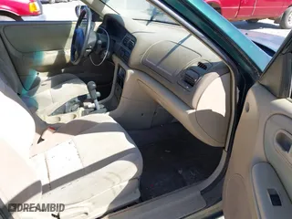 1999 Mazda 626 ES with VIN 1YVGF22C2X5859646, listed as a IAAI auction lot 41887343 with 1 mi miles. Bid and sale history available at carsss.com. Image 5.