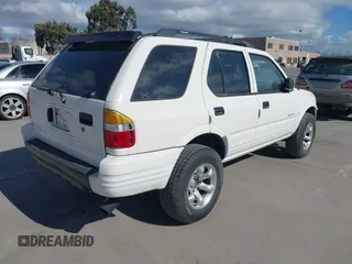 1998 Isuzu Rodeo S z VIN 4S2CK58W4W4308419, wystawiony jako IAAI lot #41711274 z przebiegiem 128 853 mil mil oraz . Historia ofert i sprzedaży dostępna na DreamBid. Obrazek 4.