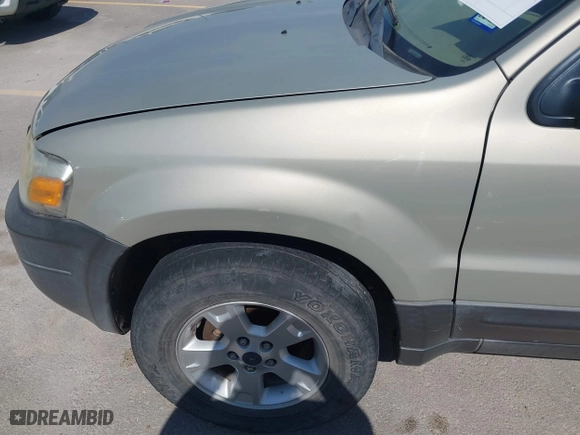 2005 Ford Escape XLT with VIN 1FMCU03165DA08296, listed as a IAAI auction lot 41677892 with 255,431 mi miles. Bid and sale history available at carsss.com. Image 6.