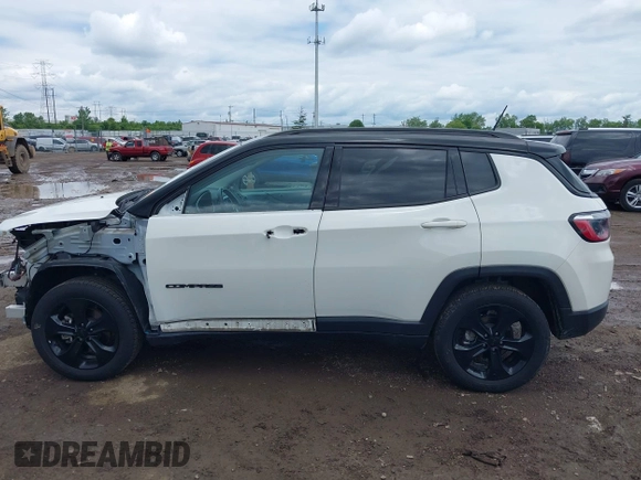 2021 Jeep Compass Altitude with VIN 3C4NJDBBXMT586529, listed as a IAAI auction lot 42296016 with 71,789 mi miles and . Bid and sale history available at DreamBid. Image 15.