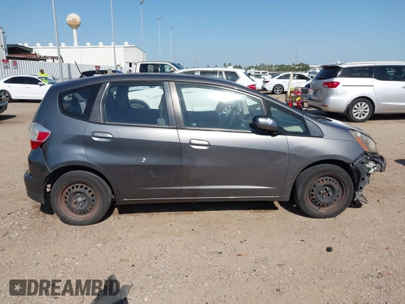 2013 Honda Fit with VIN JHMGE8H37DC048529, listed as a IAAI auction lot 42011202 with 255,113 mi miles. Bid and sale history available at carsss.com. Image 14.