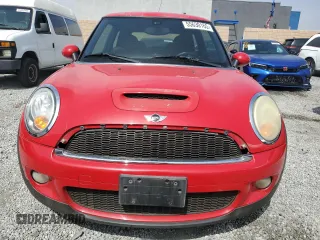 2009 MINI Hardtop S with VIN WMWMF73569TW82889, listed as a Copart auction lot 55630165 with 128,360 mi miles and Clean Title. Bid and sale history available at DreamBid. Image 5.
