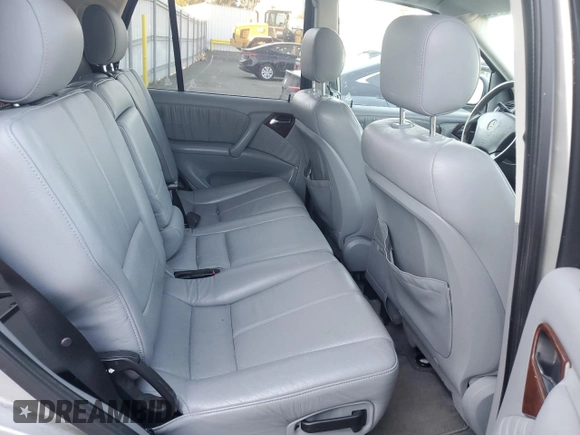 2000 Mercedes-Benz M 320/430/500 with VIN 4JGAB72E0YA167962, listed as a Copart auction lot 89158575 with 194,471 mi miles and Salvage title. Bid and sale history available at DreamBid. Image 11.