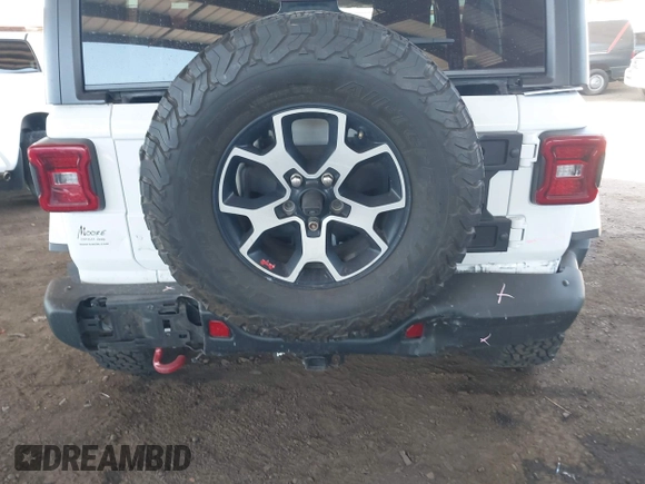 2020 Jeep Wrangler Unlimited Rubicon with VIN 1C4HJXFGXLW107958, listed as a IAAI auction lot 42058477 with 69,951 mi miles and . Bid and sale history available at DreamBid. Image 6.