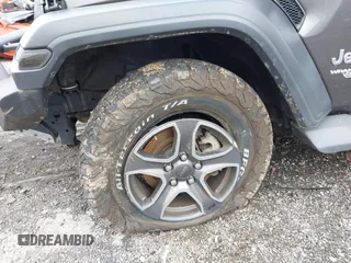 2019 Jeep Wrangler Unlimited Sport S с VIN 1C4HJXDG6KW571640, выставлен на аукционе IAAI как лот 42299078 с пробегом 51 928 миль миль и . История ставок и продаж доступна на DreamBid. Изображение 6.
