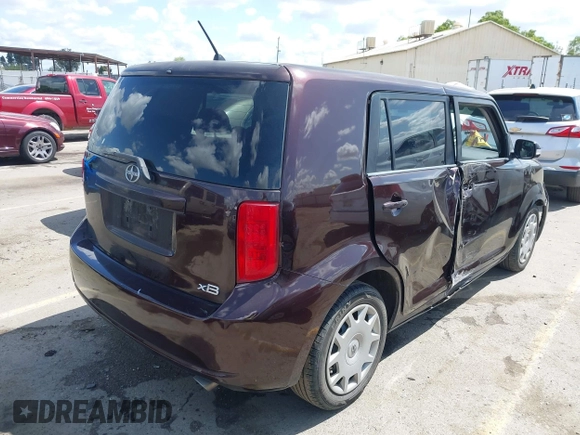 2008 Scion xB with VIN JTLKE50E281001793, listed as a IAAI auction lot 41947484 with 141,423 mi miles. Bid and sale history available at carsss.com. Image 4.