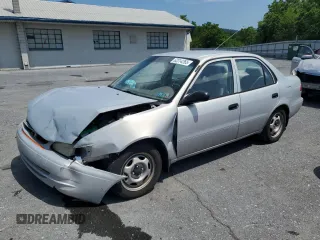 1999 Toyota Corolla VE with VIN 2T1BR12E3XC107587, listed as a Copart auction lot 62314265 with 143,734 mi miles and Salvage title. Bid and sale history available at DreamBid. Image 1.