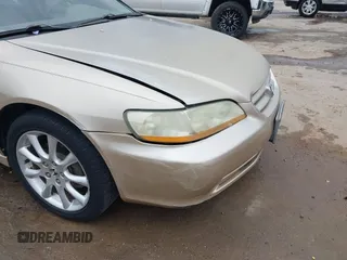 2001 Honda Accord EX z VIN 1HGCG165X1A077702, wystawiony jako IAAI lot #41770556 z przebiegiem 149 516 mil mil oraz . Historia ofert i sprzedaży dostępna na DreamBid. Obrazek 17.