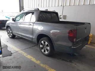 2017 Honda Ridgeline RTL-E with VIN 5FPYK3F73HB034764, listed as a IAAI auction lot 41146866 with 125,885 mi miles. Bid and sale history available at carsss.com. Image 3.