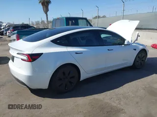 2024 Tesla Model 3 with VIN 5YJ3E1EA7RF812528, listed as a IAAI auction lot 40648421 with 3,231 mi miles. Bid and sale history available at carsss.com. Image 4.