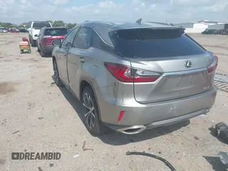 2019 Lexus RX 350 z VIN 2T2ZZMCA3KC123630, wystawiony jako IAAI lot #42436711 z przebiegiem 63 989 mil mil oraz . Historia ofert i sprzedaży dostępna na DreamBid. Obrazek 3.