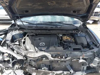 2015 Mazda CX-5 Sport with VIN JM3KE4BY3F0503011, listed as a IAAI auction lot 41973501 with 191,064 mi miles and . Bid and sale history available at carsss.com. Image 10.
