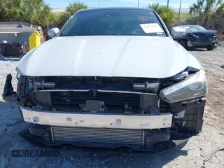 2019 Genesis G70 Dynamic with VIN KMTG34LE8KU031322, listed as a IAAI auction lot 41636994 with 55,325 mi miles and . Bid and sale history available at DreamBid. Image 6.