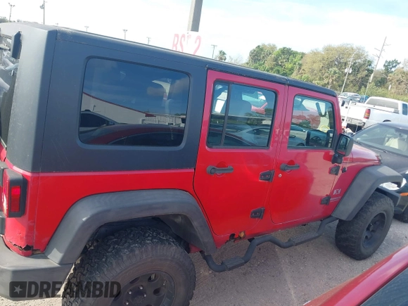 2007 Jeep Wrangler Unlimited X with VIN 1J4GA39197L171132, listed as a IAAI auction lot 41716963 with 145,442 mi miles and . Bid and sale history available at DreamBid. Image 14.