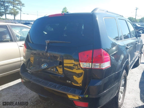 2009 Kia Borrego LX with VIN KNDJJ741295020182, listed as a IAAI auction lot 42012595 with 170,929 mi miles. Bid and sale history available at carsss.com. Image 4.
