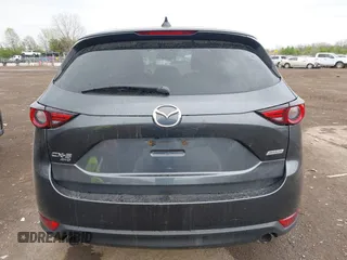 2017 Mazda CX-5 Grand Touring with VIN JM3KFBDL3H0143194, listed as a IAAI auction lot 42049258 with 74,159 mi miles. Bid and sale history available at carsss.com. Image 16.