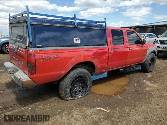 2002 Nissan Frontier XE with VIN 1N6ED29Y12C388949, listed as a Copart auction lot 55235875 with 212,944 mi miles and Salvage title. Bid and sale history available at DreamBid. Image 3.