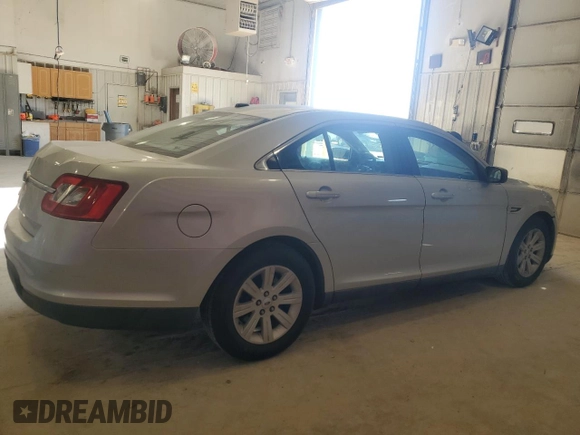 2011 Ford Taurus SE with VIN 1FAHP2DW6BG116196, listed as a Copart auction lot 52441955 with 201,487 mi miles and Salvage Title. Bid and sale history available at DreamBid. Image 3.