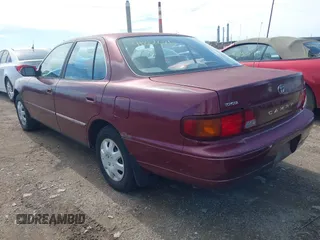 1996 Toyota Camry DX with VIN 4T1BG12K1TU785209, listed as a IAAI auction lot 41802026 with 223,452 mi miles. Bid and sale history available at carsss.com. Image 14.