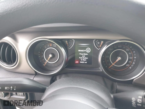 2019 Jeep Wrangler Unlimited Sport Altitude with VIN 1C4HJXDG0KW559807, listed as a IAAI auction lot 41790082 with 34,221 mi miles and . Bid and sale history available at DreamBid. Image 7.