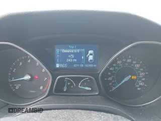 2012 Ford Focus SE with VIN 1FAHP3F25CL446064, listed as a IAAI auction lot 41883353 with 142,468 mi miles. Bid and sale history available at carsss.com. Image 7.