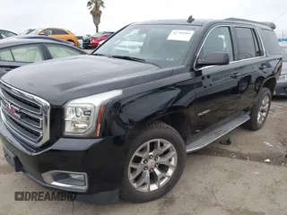 2015 GMC Yukon SLT with VIN 1GKS1BKC3FR129173, listed as a IAAI auction lot 41795585 with 97,893 mi miles. Bid and sale history available at carsss.com. Image 22.