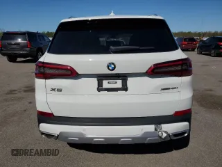 2020 BMW X5 xDrive40i with VIN 5UXCR6C09L9C13127, listed as a Copart auction lot 53941035 with 76,685 mi miles and Salvage title. Bid and sale history available at DreamBid. Image 6.