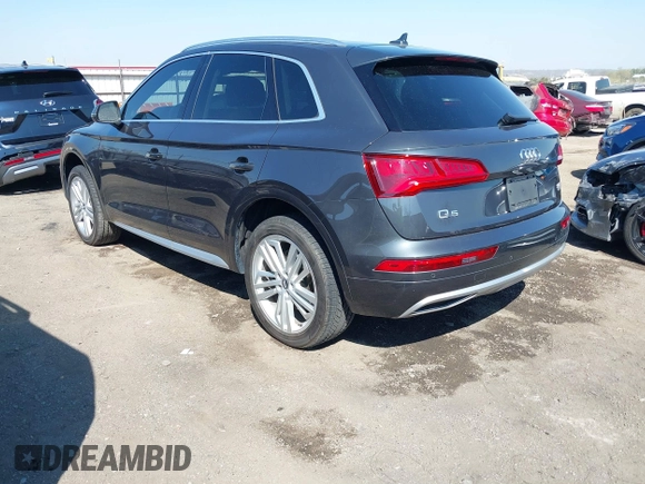 2018 Audi Q5 Premium Plus z VIN WA1BNAFY7J2149356, wystawiony jako IAAI lot #41851706 z przebiegiem 134 874 mil mil oraz . Historia ofert i sprzedaży dostępna na DreamBid. Obrazek 3.