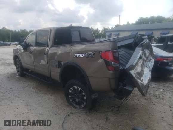 2023 Nissan Titan Pro-4X with VIN 1N6AA1FB4PN111502, listed as a Copart auction lot 60640414 with 13,254 mi miles and Non repairable. Bid and sale history available at DreamBid. Image 2.