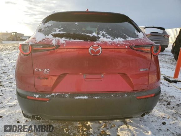 2024 Mazda CX-30 S Premium with VIN 3MVDMBDM9RM617646, listed as a Copart auction lot 43550105 with 11,041 mi miles and Salvage Title. Bid and sale history available at DreamBid. Image 6.