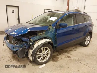 2018 Ford Escape SE with VIN 1FMCU9GD4JUA83470, listed as a IAAI auction lot 41272882 with 105,661 mi miles. Bid and sale history available at carsss.com. Image 2.