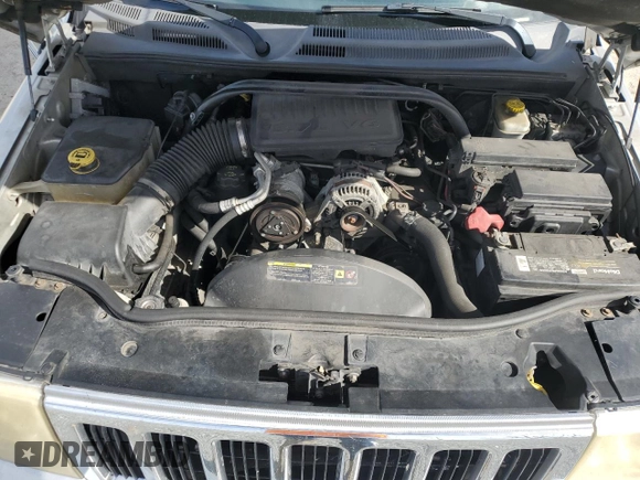 2006 Jeep Commander with VIN 1J8HH48K96C289162, listed as a Copart auction lot 80979074 with 170,581 mi miles and Salvage title. Bid and sale history available at DreamBid. Image 12.