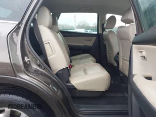 2015 Mazda CX-9 Touring with VIN JM3TB2CA5F0469348, listed as a IAAI auction lot 41516084 with 134,460 mi miles. Bid and sale history available at carsss.com. Image 8.