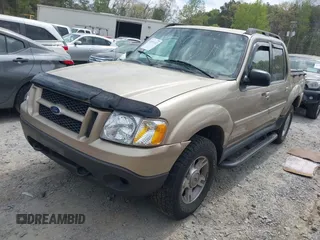 2002 Ford Explorer Sport Trac Value z VIN 1FMZU67E32UB39918, wystawiony jako IAAI lot #41937332 z przebiegiem 201 713 mil mil oraz . Historia ofert i sprzedaży dostępna na DreamBid. Obrazek 2.