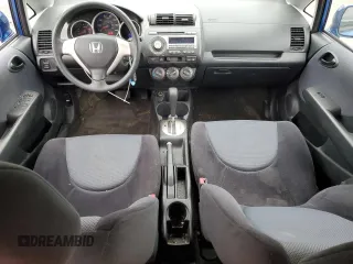 2007 Honda Fit with VIN JHMGD38497S020207, listed as a Copart auction lot 57447875 with 185,603 mi miles and Salvage title. Bid and sale history available at DreamBid. Image 8.