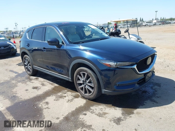2018 Mazda CX-5 Grand Touring с VIN JM3KFBDM6J0326684, выставлен на аукционе IAAI как лот 42087646 с пробегом 111 192 миль миль и . История ставок и продаж доступна на DreamBid. Изображение 1.