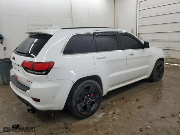 2015 Jeep Grand Cherokee SRT with VIN 1C4RJFDJ6FC902573, listed as a Copart auction lot 43718305 with 0 mi miles and Salvage Title. Bid and sale history available at carsss.com. Image 3.