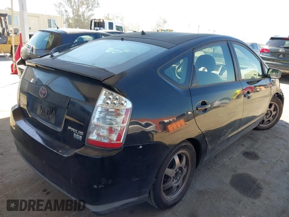 2007 Toyota Prius with VIN JTDKB20U673257335, listed as a IAAI auction lot 42707876 with 206,399 mi miles and . Bid and sale history available at DreamBid. Image 4.