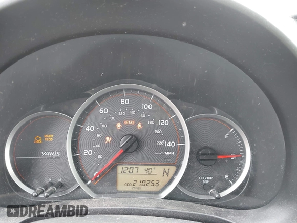 2012 Toyota Yaris L with VIN JTDKTUD30CD539341, listed as a IAAI auction lot 41981342 with 210,253 mi miles. Bid and sale history available at carsss.com. Image 7.