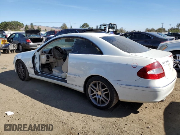 2009 Mercedes-Benz CLK-Class 3.5L with VIN WDBTJ56H39F264312, listed as a Copart auction lot 76835154 with 125,624 mi miles and Salvage Title. Bid and sale history available at carsss.com. Image 2.