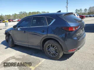 2021 Mazda CX-5 Touring with VIN JM3KFACM1M0442455, listed as a Copart auction lot 48187985 with 49,970 mi miles and Salvage Title. Bid and sale history available at carsss.com. Image 2.