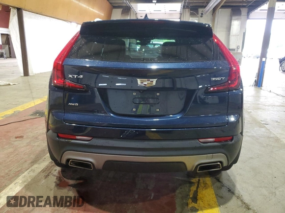2021 Cadillac XT4 AWD Premium Luxury with VIN 1GYFZDR41MF031543, listed as a Copart auction lot 61085805 with 21,318 mi miles and Salvage title. Bid and sale history available at DreamBid. Image 6.