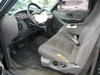 2003 Ford F-150 XL with VIN 1FTRF07W33KB56591, listed as a Copart auction lot 64170993 with 150,941 mi miles and Salvage title. Bid and sale history available at DreamBid. Image 7.