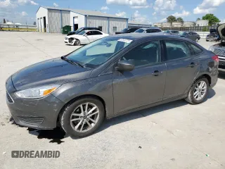 2018 Ford Focus SE with VIN 1FADP3F26JL272212, listed as a Copart auction lot 56644725 with 96,436 mi miles and Salvage title. Bid and sale history available at DreamBid. Image 1.
